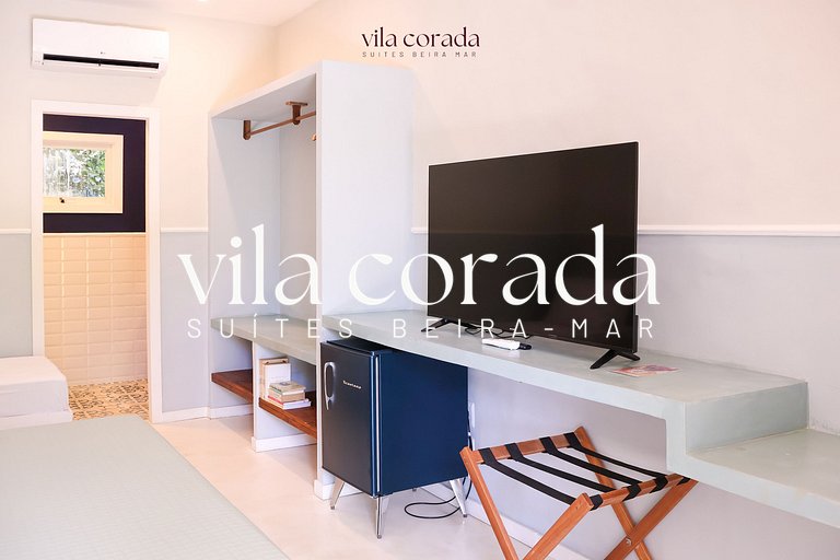 Suite tripla charmosa frente jardim