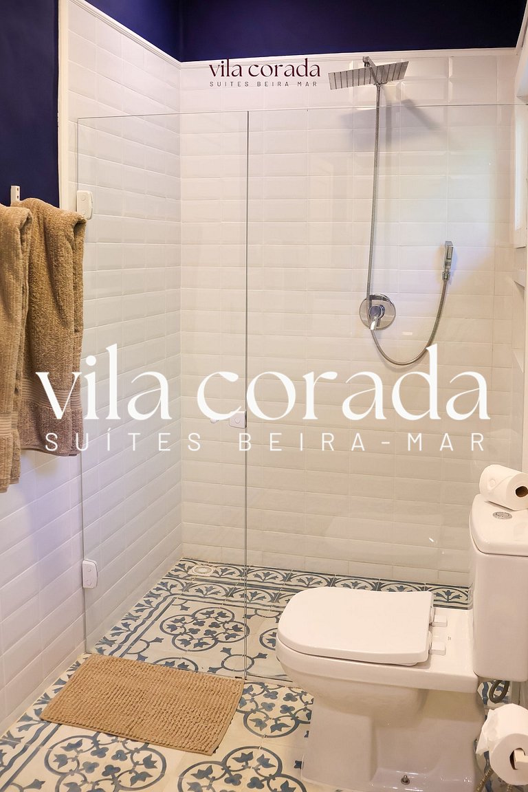 Suite tripla charmosa frente jardim