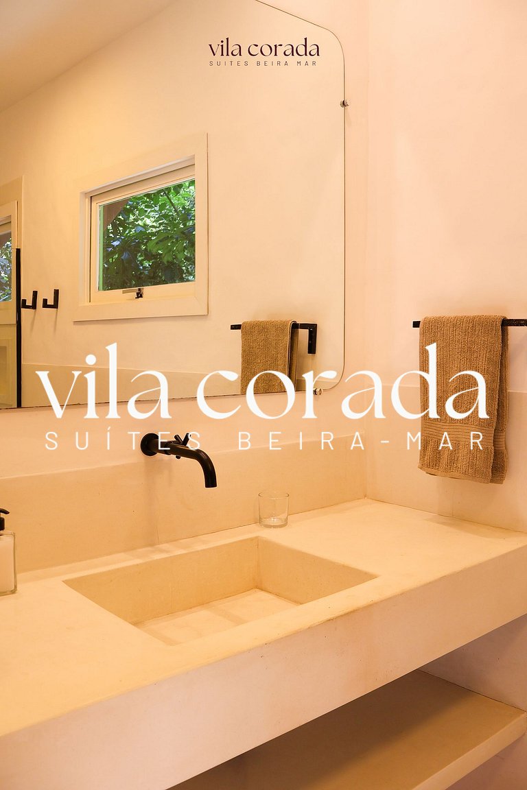 Suite casal deluxe frente jardim